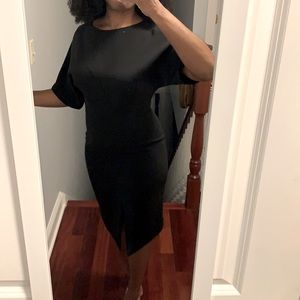 Formal knee length black dress with split